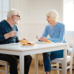 Delighted couple having conversation during lunch